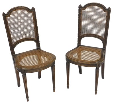 Lot 84 - A pair of 19thC French walnut bedroom chairs,...