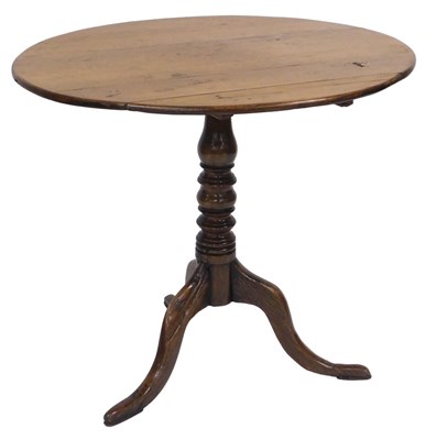 Lot 125 - A 19thC oak supper table, with a circular tilt...