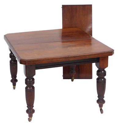 Lot 126 - A late Victorian walnut extending dining table,...