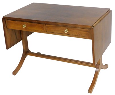 Lot 28 - A Regency style figured walnut sofa table,...
