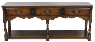 Lot 181 - A 18thC style oak dresser base, with three...