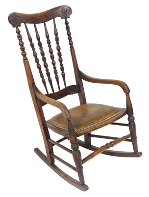 Lot 195 - A Victorian simulated rosewood rocking chair,...