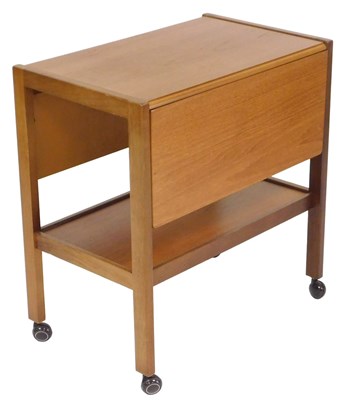 Lot 151 - A teak drop leaf tea trolley.