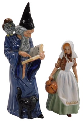 Lot 132 - A Royal Doulton figure, modelled as The Wizard,...