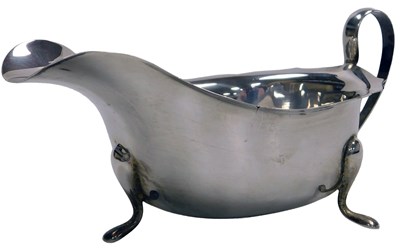 Lot 171 - A George V silver sauce boat, with a curved...