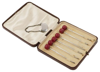 Lot 215 - A set of six George V silver cocktail sticks,...