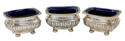 Lot 219 - A set of three Victorian semi fluted salt...