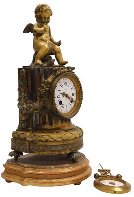 Lot 257 - A late 19thC bronze and ormolu mantel clock,...