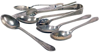 Lot 263 - A set of four George V silver teaspoons, with...