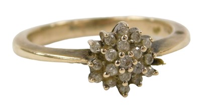 Lot 268 - A 9ct and white gold and diamond flowerhead...