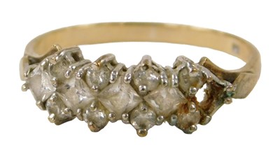 Lot 269 - A 9ct gold and CZ dress ring, one stone...
