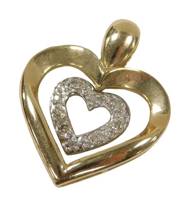 Lot 277 - A 9ct gold and diamond double heart pendant, 2....
