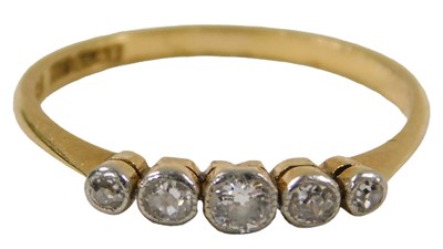 Lot 282 - A diamond five stone ring, in a graduated claw...