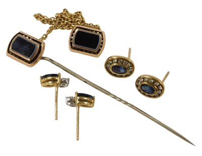 Lot 284 - A pair of sapphire and diamond earrings, in an...