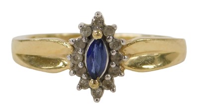 Lot 285 - A sapphire and diamond ring, the marquise cut...