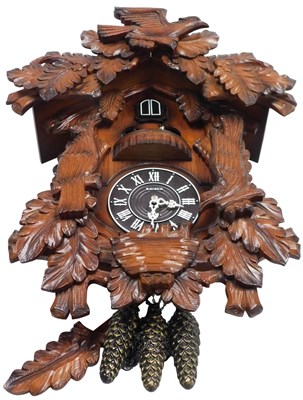 Lot 297 - A Kaiser Black Forest Cuckoo clock, circular...