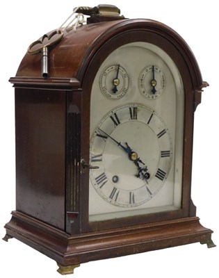 Lot 301 - An early 20thC mahogany cased mantel clock,...