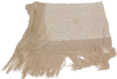 Lot 321 - An early 20thC cream silk shawl, embroidered...