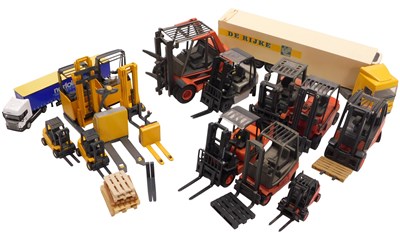 Lot 333 - Four Schuco Lynde diecast models of forklift...