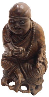 Lot 334 - A late 19thC Chinese hardwood figure of a...