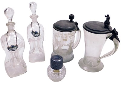 Lot 338 - A pair of Victorian cut hour glass decanters,...