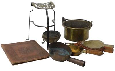 Lot 358 - A Georgian brass and cast iron fireside trivet,...
