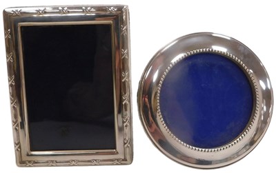 Lot 387 - An Elizabeth II silver back strut circular...