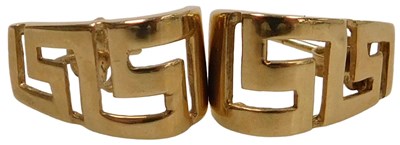 Lot 391 - A pair of curved earrings, in Greek key pierce...
