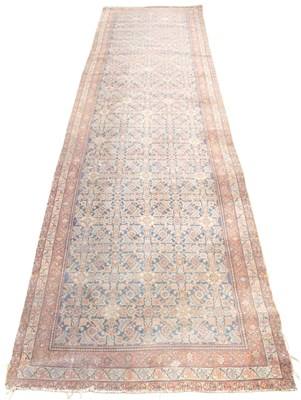 Lot 407 - A Persian blue ground runner, decorated with...