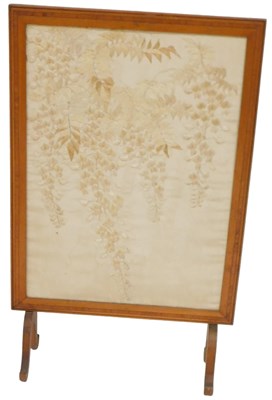 Lot 412 - An Edwardian mahogany fire screen, with...