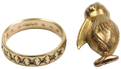 Lot 421 - A 9ct gold Pelican charm, together with CZ...