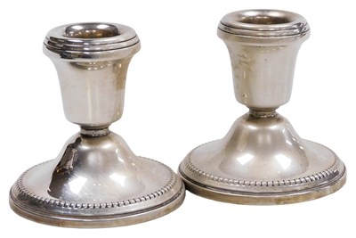 Lot 424 - A pair of Elizabeth II loaded silver squat...