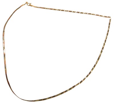 Lot 429 - A 9ct three colour gold brick link neck...
