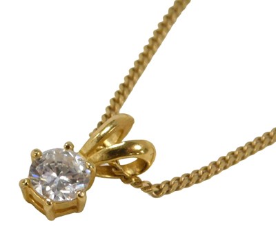 Lot 287 - A CZ pendant, in yellow metal unmarked, on a...