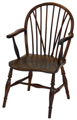 Lot 22 - A 19thC yew and elm Windsor chair, of plain...