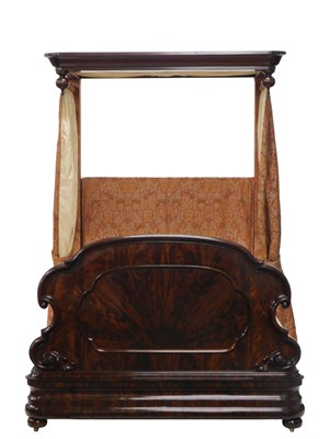 Lot 31 - A Victorian figured mahogany half tester bed,...