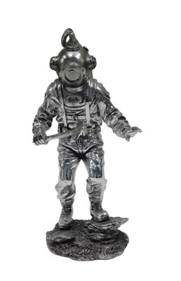 Lot 103 - A figure of a deep sea diver, silver...