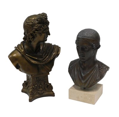 Lot 104 - A bronze finished bust of Apollo, on inverted...