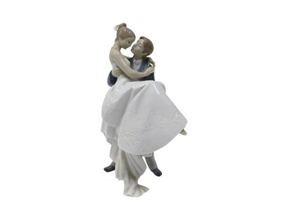 Lot 113 - A Lladro figure group Happiest Day, 27cm high....