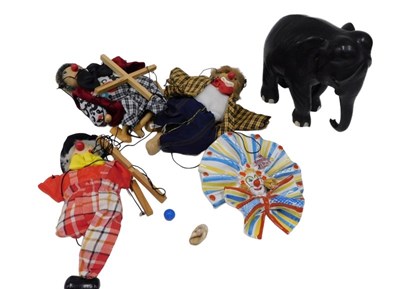 Lot 165 - An ebonised standing elephant figure, 16cm...