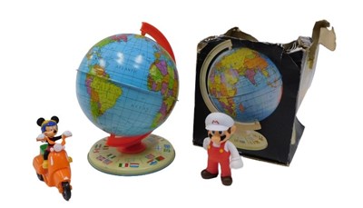 Lot 170 - A child's tin plate and plastic globe, on axis,...