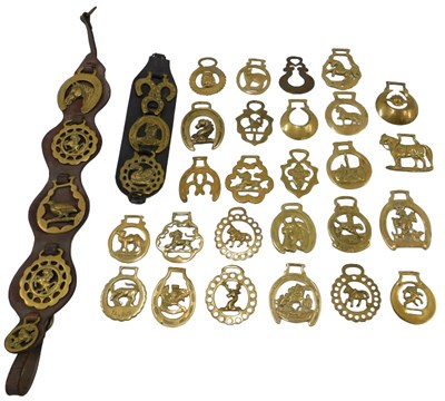 Lot 216 - Various brass martingales and horse brasses,...