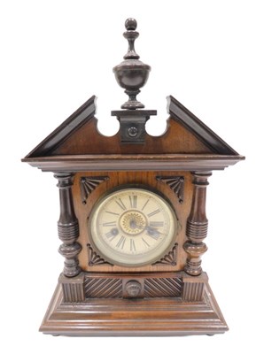 Lot 224 - An Edwardian walnut mantel clock, the 12cm...
