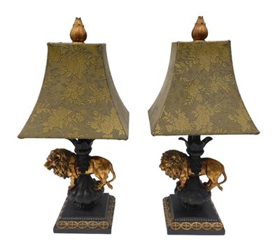 Lot 228 - A pair of table lamps, with elaborate shades,...