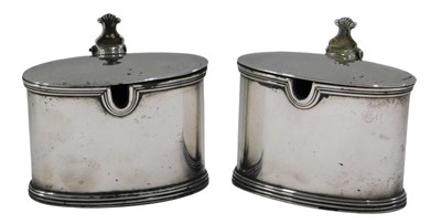 Lot 234 - A matched pair of George V silver mustard pots,...