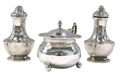 Lot 242 - A Harlequin silver cruet set, comprising two...