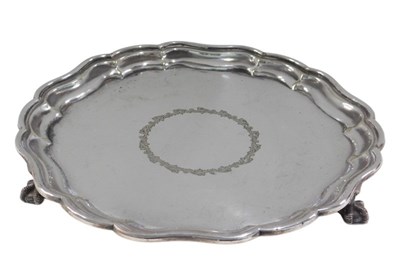 Lot 260 - A 19thC salver, pie crust edge, central floral...