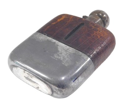 Lot 261 - An early 20thC crocodile finish and silver...