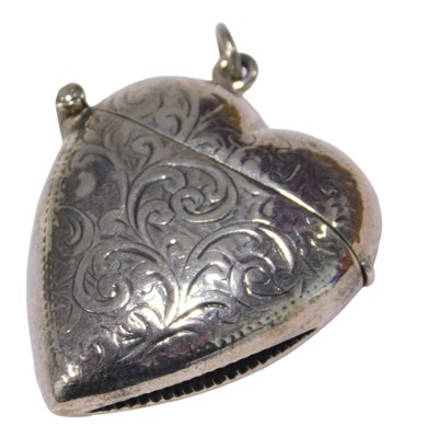 Lot 263 - An early 20thC heart shaped Vesta case,...