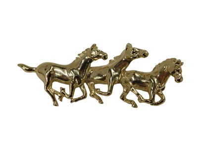 Lot 93 - A horse bar brooch, formed as three galloping...